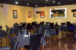 A portion of La Piazza's warm intimate dining room.