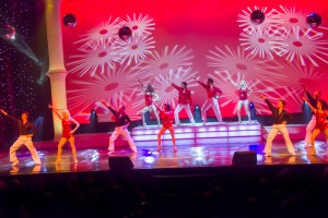 One of the show's many production numbers featuring vocalists and the dancers.