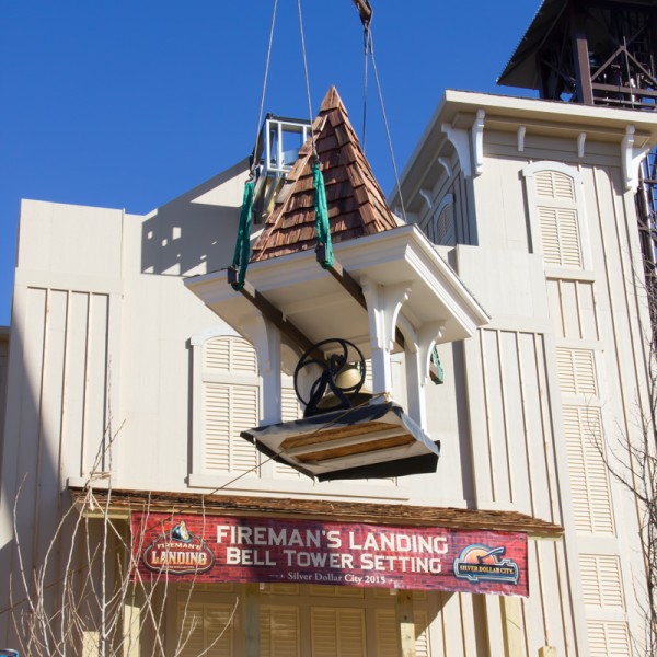 The "Bell Tower: being lifted atop Station #3" at "Fireman's Landing in January of this year.