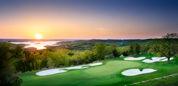 The beautiful Top of the Rock Par 3 Course with the sun setting over Table Rock Lake.