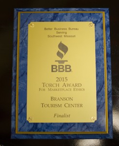 The Southwestern Missouri Better Business Bureau's Torch Finalist plaque presented to Branson Tourism Center for Marketplace Ethics.