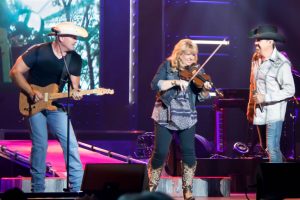 "Raiding the Country Vault's Colt Prather, right, Melody Hart, and Billy Yates during their spectacular performance of "The Devil Went Down To Georgia."